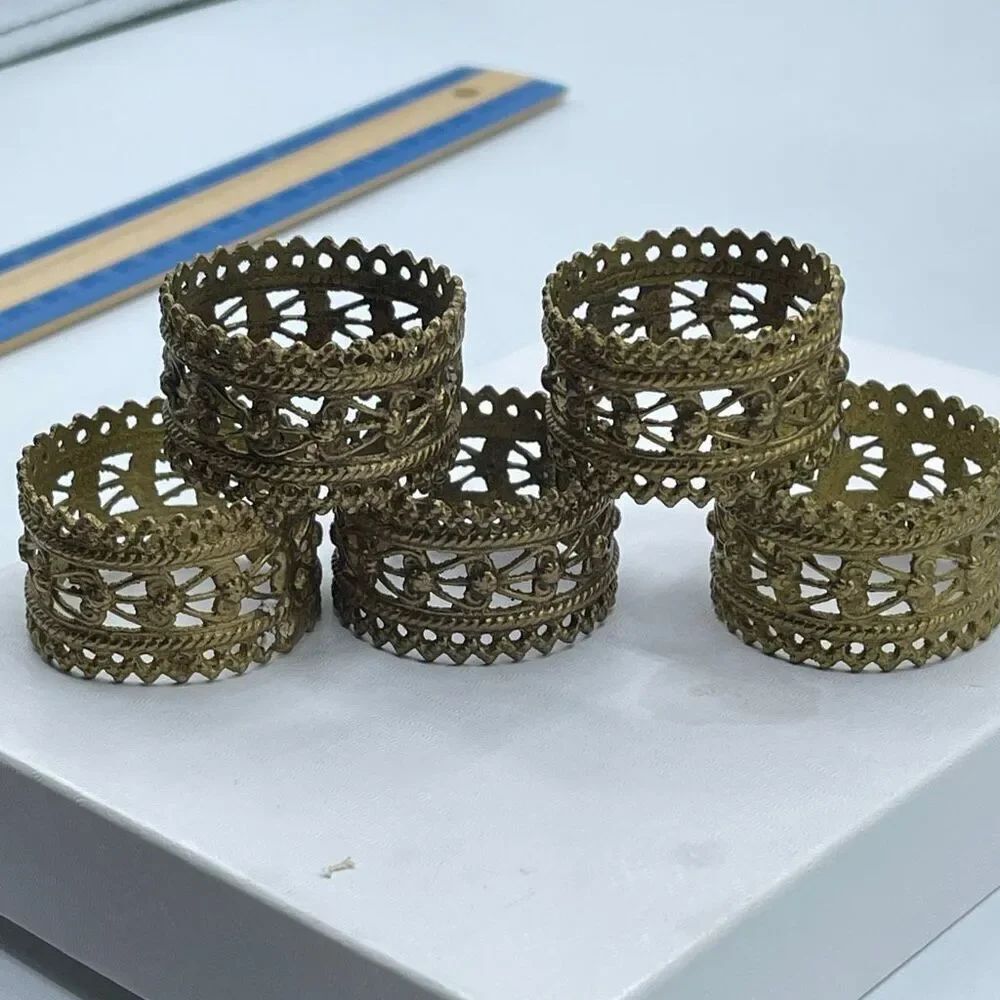 Set of 5 vintage ornate brass napkin ring holders.